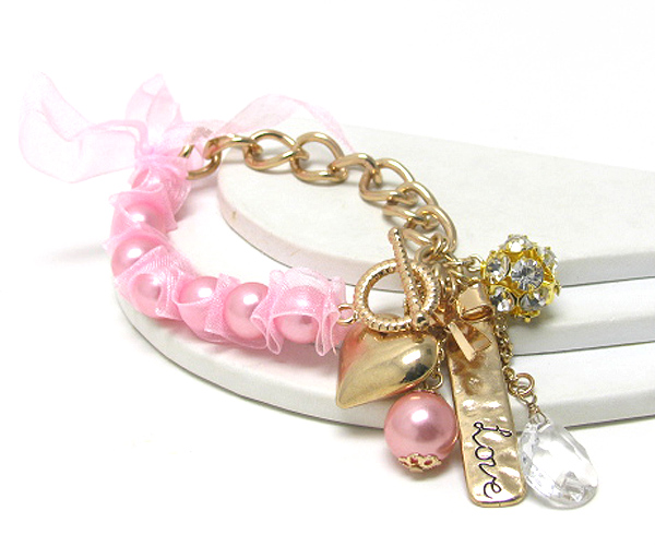 Multi charm ribbon tied pearl and metal chain ling bracelet