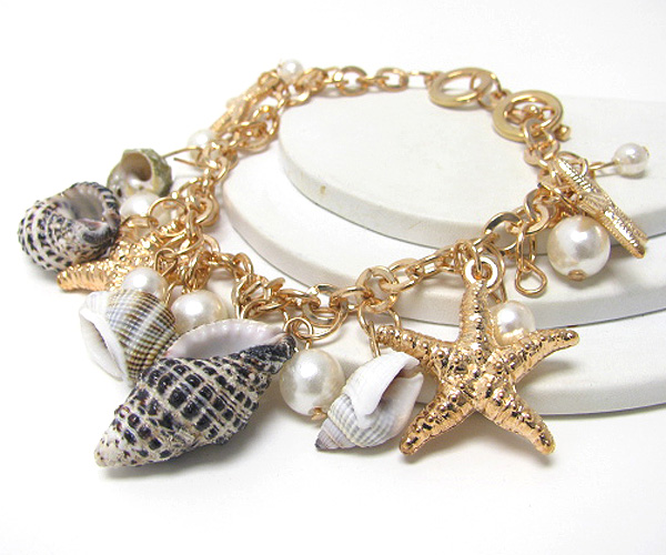 Multi sea shell and pearl charm bracelet