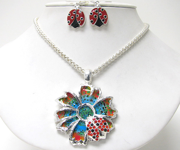 Crystal ladybug on flower and paint back pendant necklace earring set