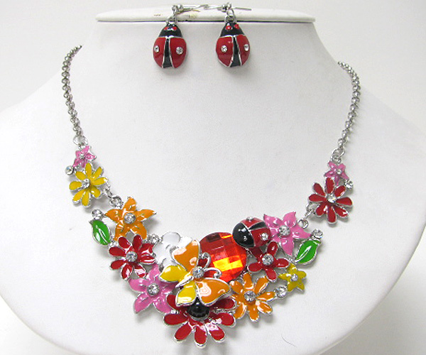 Garden theme butterfly and flower epoxy necklace earring set