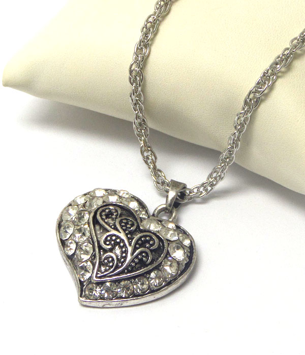 Crystal on metal filigree heart necklace