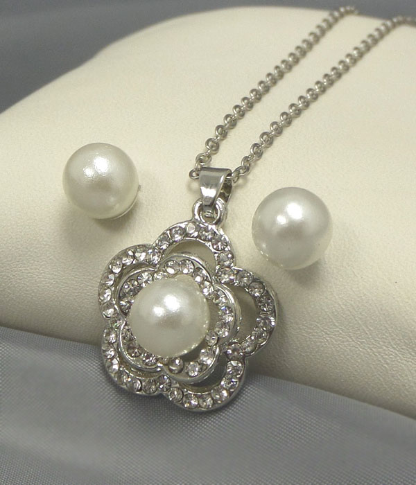 Crystal and pearl center flower necklace earring set