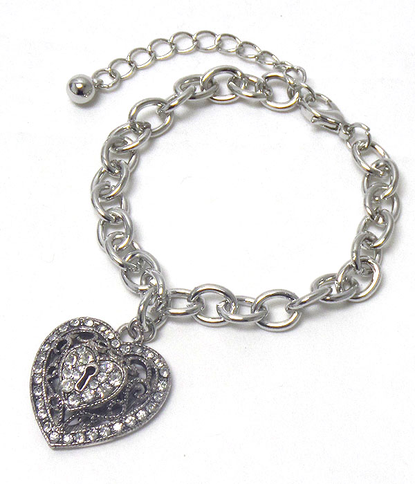 Crystal on metal filigree heart charm bracelet