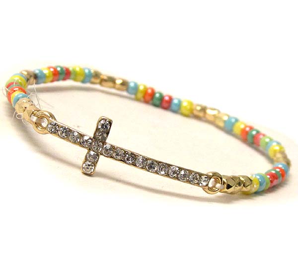 Crystal cross and multi bead stretch bracelet