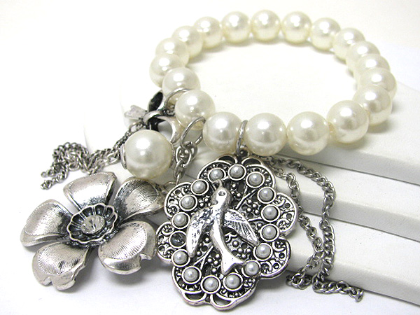 Burnish metal flower and bird charm pearl stretch bracelet