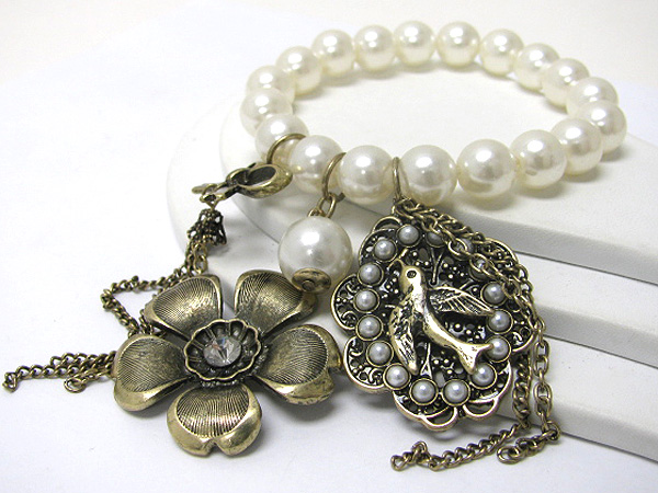 Burnish metal flower and bird charm pearl stretch bracelet