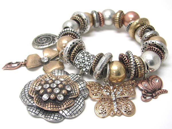 Antique look crystal stud multi burnish metal flower and butterfly charm stretch bracelet