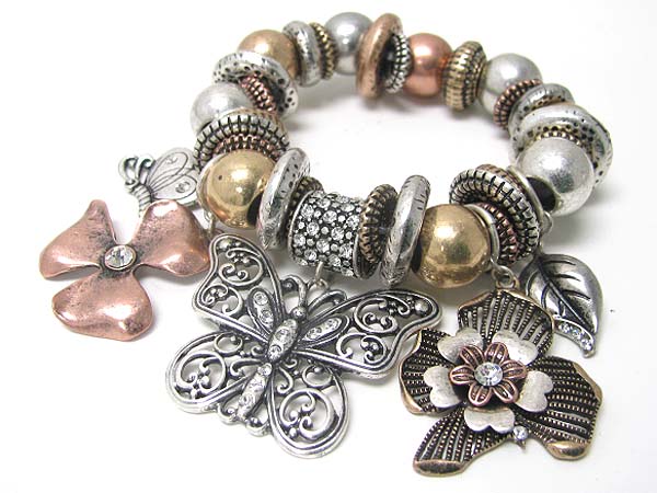 Antique look crystal stud multi burnish metal flower and butterfly charm stretch bracelet