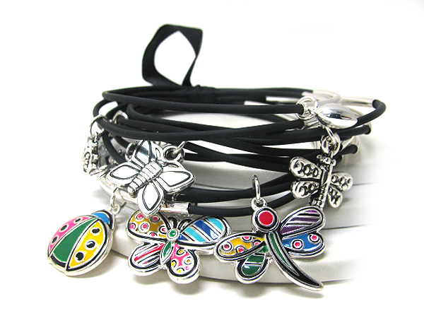 Multi layer butterfly and ladybug  charm tied ribbon on cord bracelet  