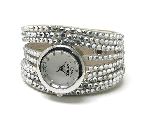 Metal face and crystal on genuine leatherette  band watch