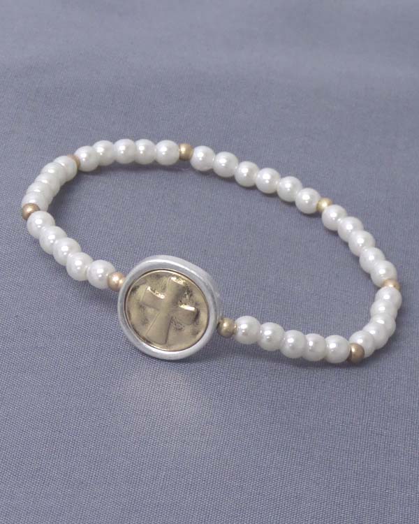 Cross stamp disk and stretch pearl bracelet