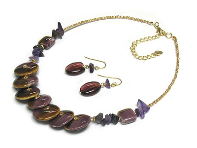 Figurine diskes and glass stones seed bead necklace and earring set