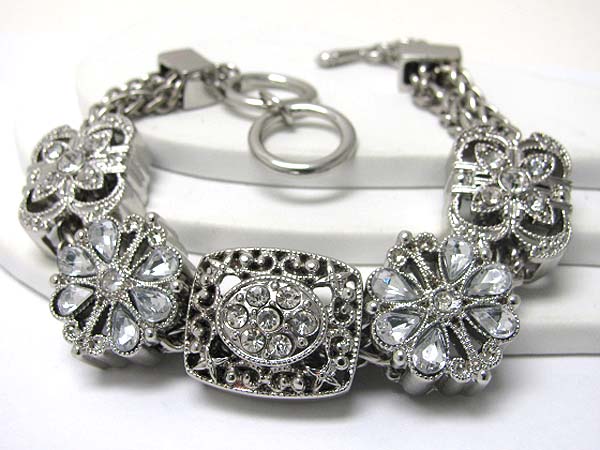 Marcasite look filigree metal disk link bracelet