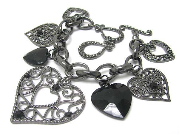 Crystal and metal filigree heart cahrm dangle toggle bracelet 