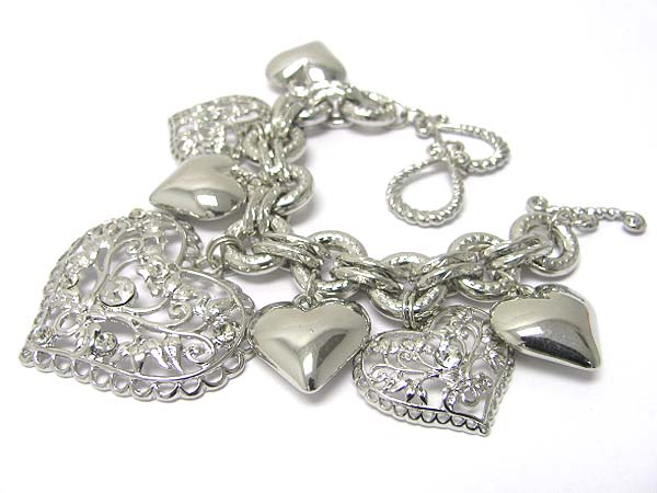 Crystal and metal filigree heart cahrm dangle toggle bracelet 