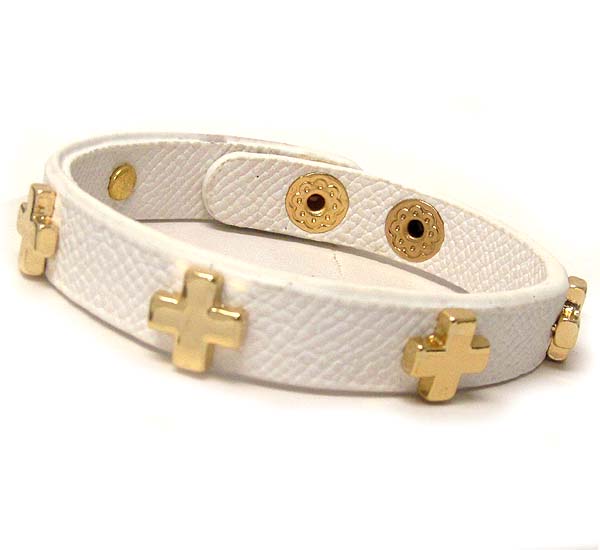 Multi cross pattren on  leather button bracelet