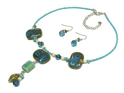 Figurine and wood drop seed bead necklace and earring set