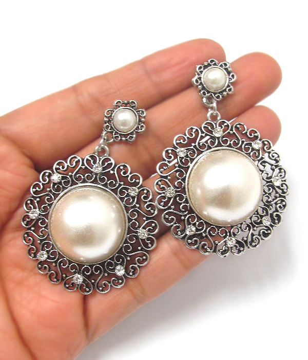 Metal textured pearl center earrings