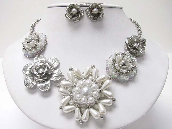 Pearl and metal flower link necklace earring set