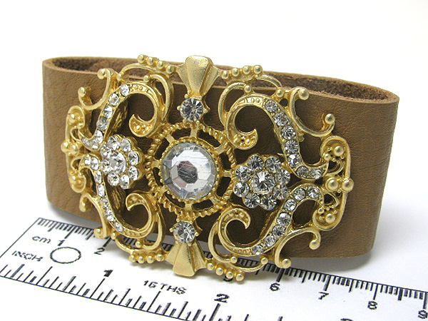 Multi crystal metal filigree on leather button bracelet