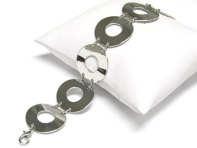 Metal donut disk link bracelet