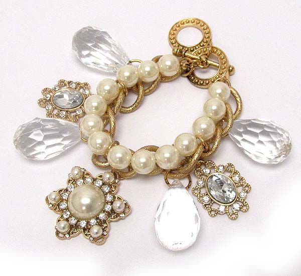 Crystal pearl and chain with clear acryl tear drop and crystal metal flower charm dangle toggle bracelet