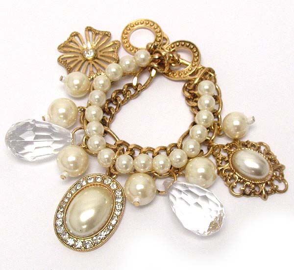 Crystal oval pearl and chain with clear acryl tear drop and crystal metal flower charm dangle toggle bracelet