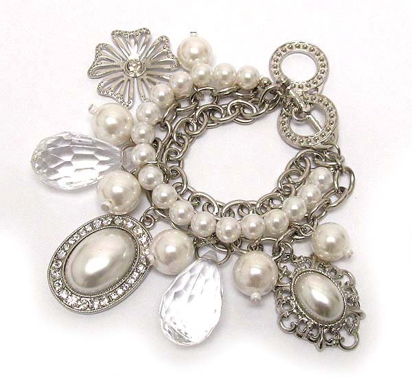 Crystal oval pearl and chain with clear acryl tear drop and crystal metal flower charm dangle toggle bracelet