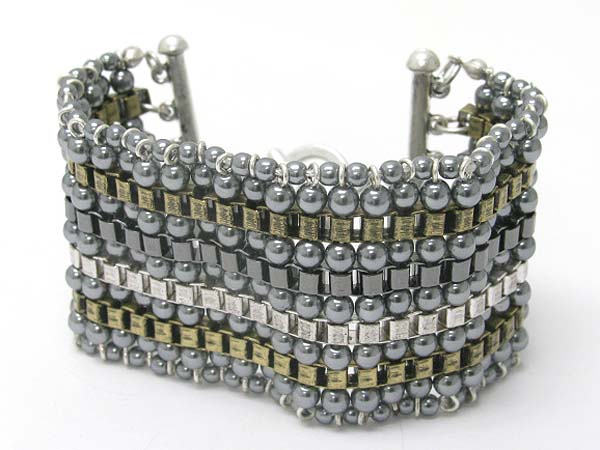 Multi row metal ball and chain link bracelet