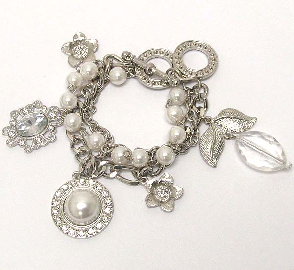 Crystal pearl and chain with clear acryl oval drop and crystal metal flower charm dangle toggle bracelet