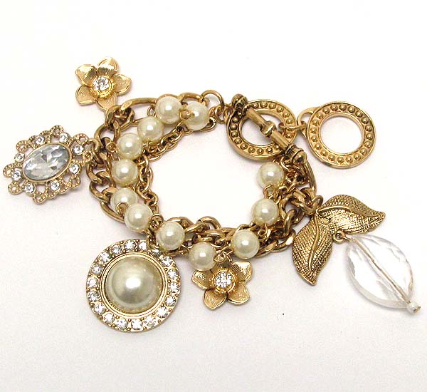 Crystal pearl and chain with clear acryl oval drop and crystal metal flower charm dangle toggle bracelet