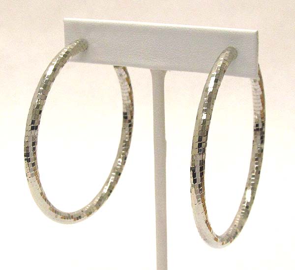 Multi metal piece twisted hollow hoop earring - hoops