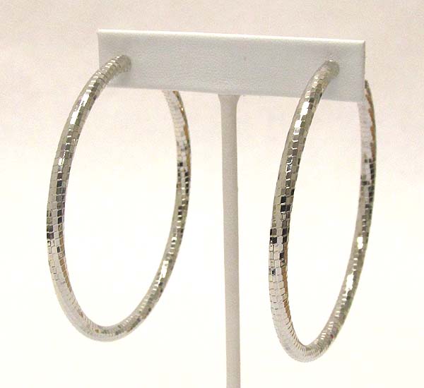 Multi metal piece twisted hollow hoop earring - hoops