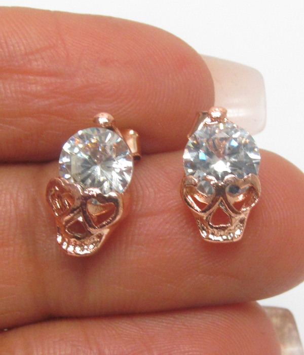 Skull with crystal earrings