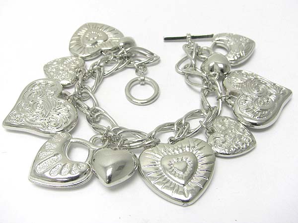 Multi metal texture heart charm toggle bracelet