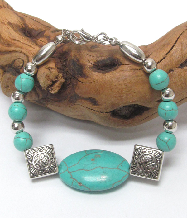 Handmade turquoise and tibetan silver bracelet