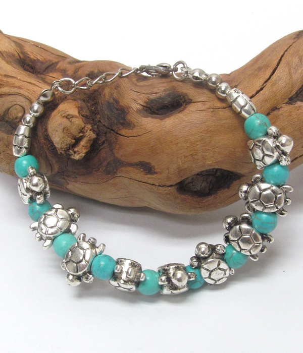 Handmade turquoise and tibetan silver bracelet