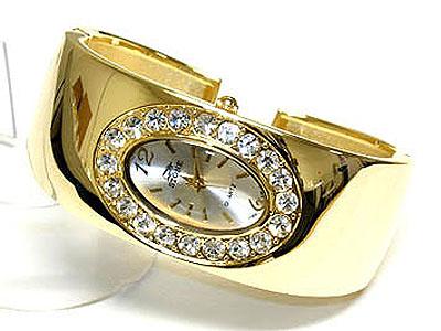 Paved crystal surround face metal bangle watch