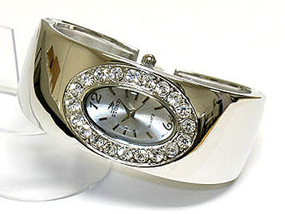 Paved crystal surround face metal bangle watch