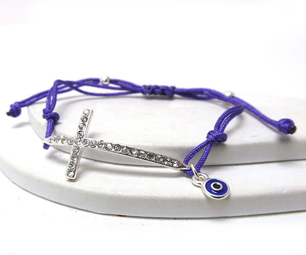 Crystal deco cross and evil eye braided cord bracelet