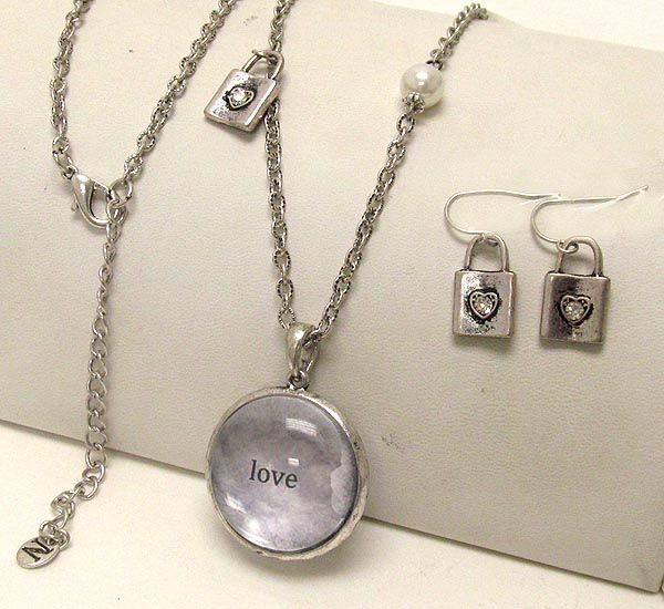 Metal textured lock and pearl drop round  clear acryl love theme necklace earring set