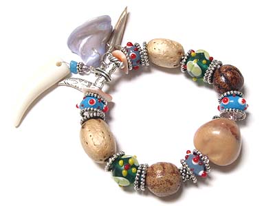 Ethnic kukui and wood beads and shell dangle stretch bracelet