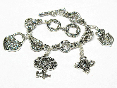 Metal filigree charm toggle bracelet