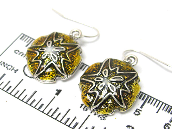 Metal sand dollar earring