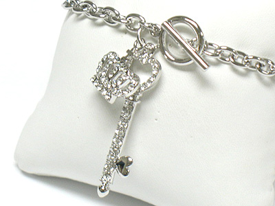 Whitegold palting crystal key and crown charm toggle bracelet