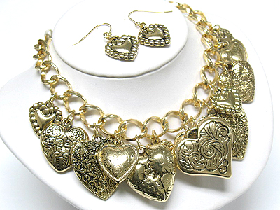 Multi metal filigree heart dangle necklace and earring set