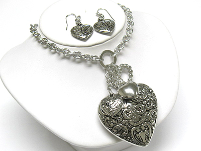 Metal filigree heart y drop necklace and earring set