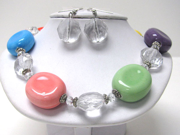 Large figurine and acrylic bead necklace earring set