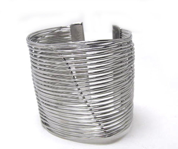 Multi row metal wire and one zig zag wireind on center cuff bangle