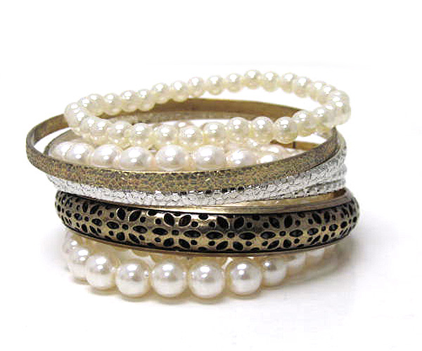 Multi row pearl and pebble metal bracelet